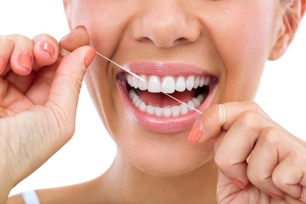 flossing your teeth